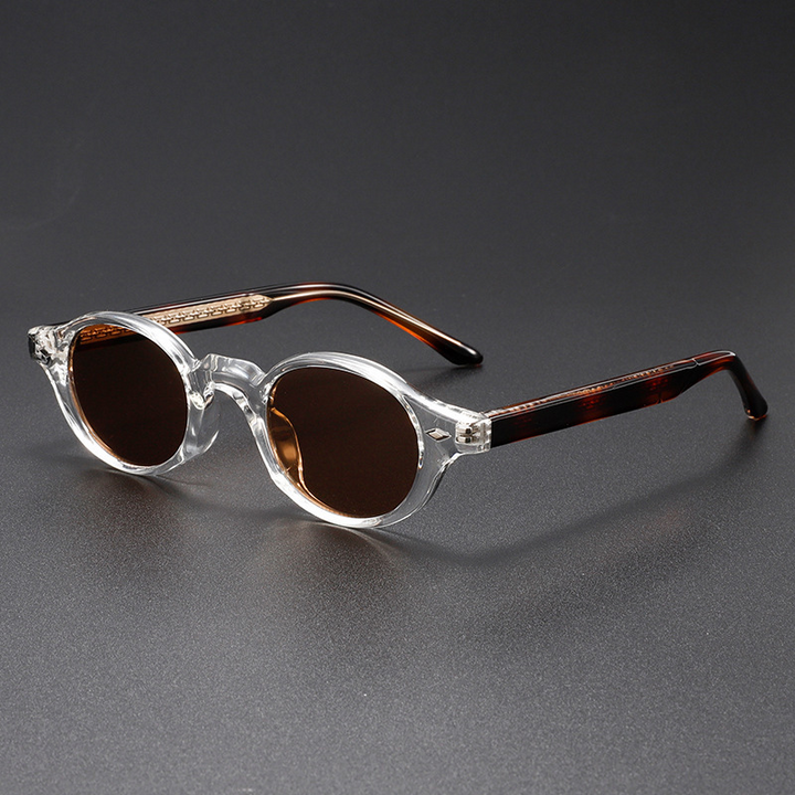 Stylish unisex retro sunglasses with UV400 protection. Classic oval design & dark tint, perfect fashion accessory.