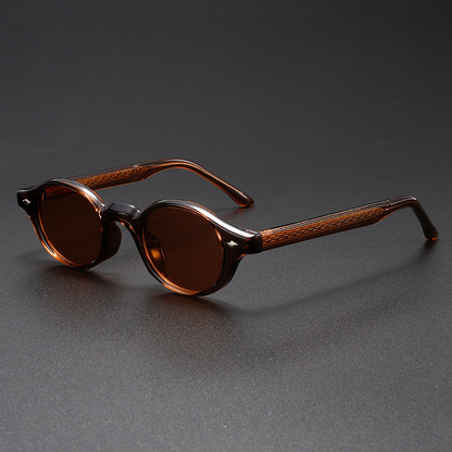 Classic retro unisex oval sunglasses with dark tint lenses & sturdy acetate frame. Offers full UV400 protection.