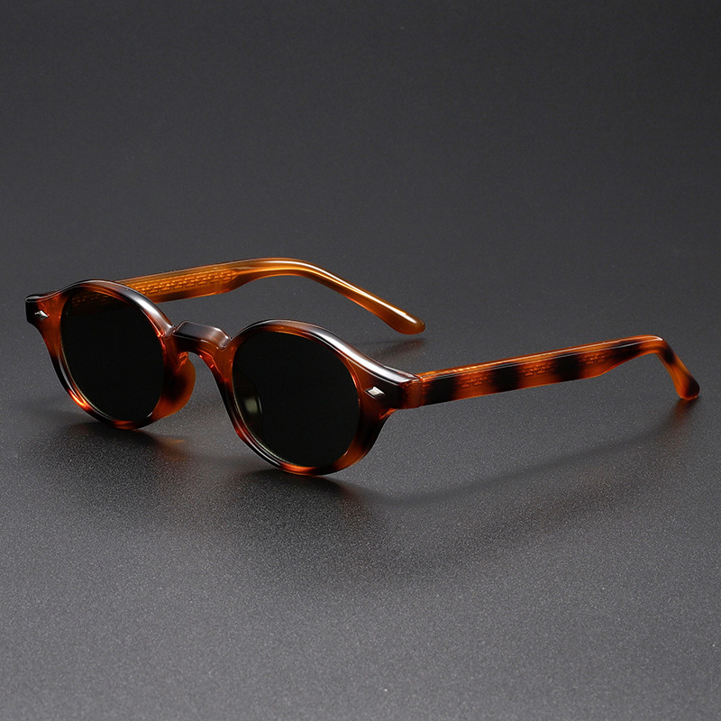 Fashionable unisex retro shades. These classic oval sunglasses feature dark tint lenses & UV400 protection.