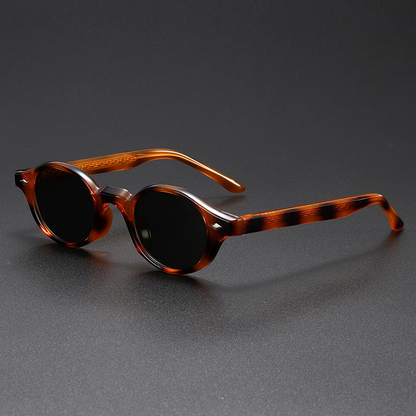 Fashionable unisex retro shades. These classic oval sunglasses feature dark tint lenses & UV400 protection.