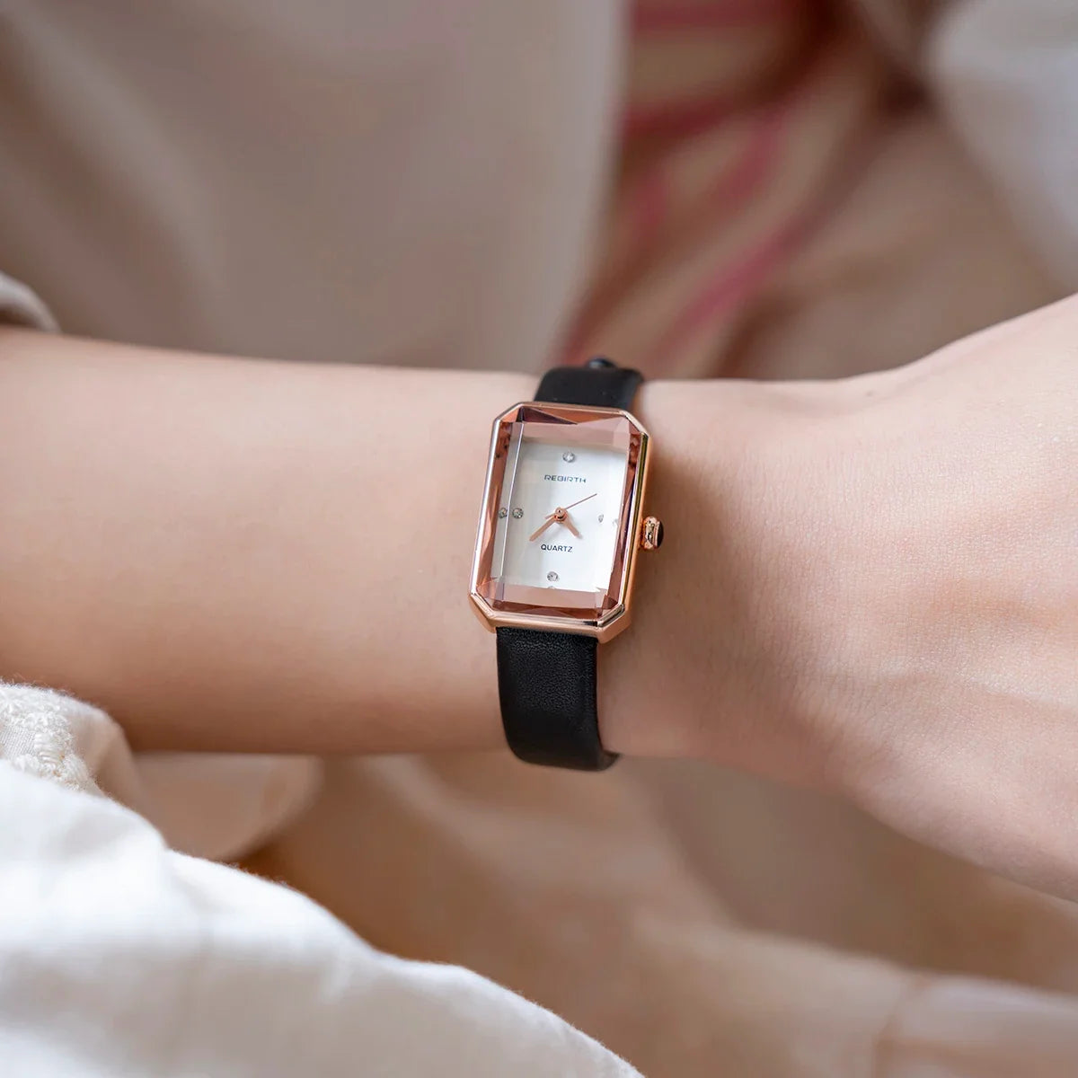 Close-up of classic rectangular Slim Quartz Watch face, showcasing minimalist design.