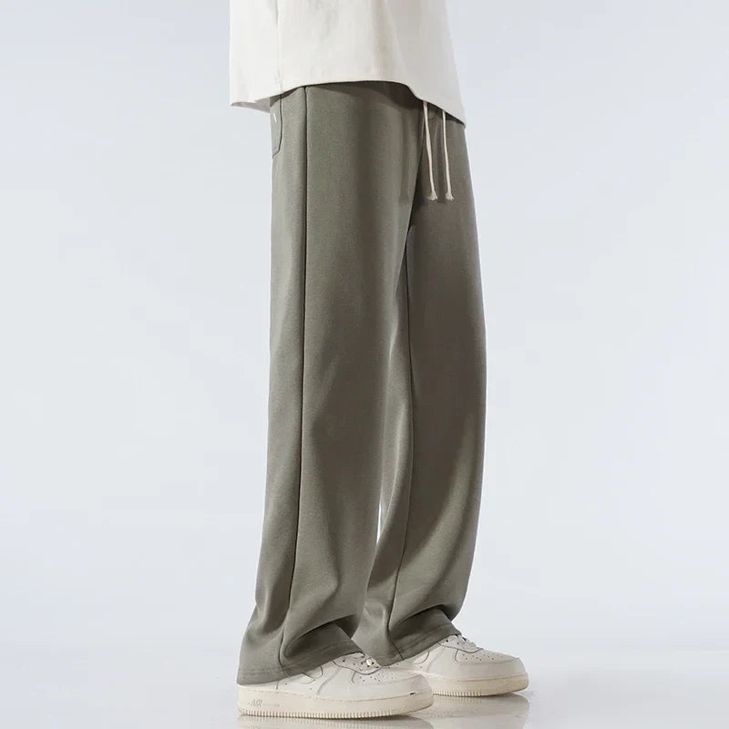 Everyday wide-leg sweatpants, featuring a relaxed fit & drawstring for unisex comfort wear.