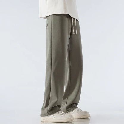 Everyday wide-leg sweatpants, featuring a relaxed fit & drawstring for unisex comfort wear.