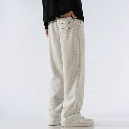 Drawstring wide-leg sweatpants, offering everyday comfort & versatile athleisure style for all.