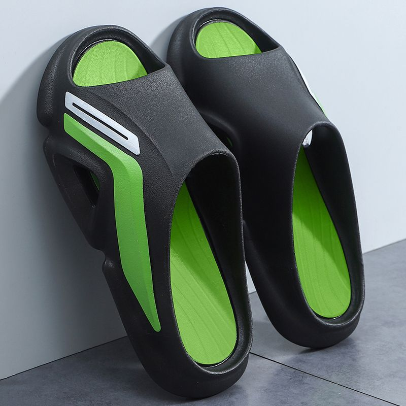 A pair of colorful unisex Cloud Cushion Slides, showcasing the soft EVA foam material and ergonomic design.