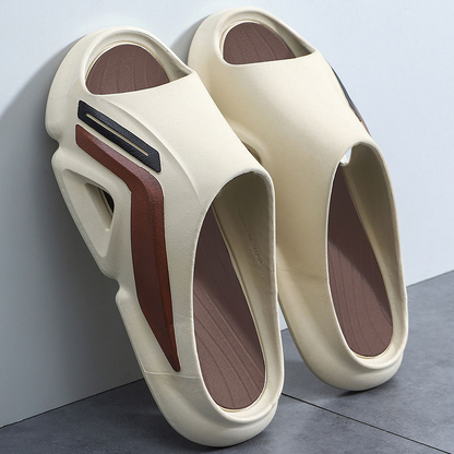 Pair of unisex Cloud Cushion Slides, featuring a thick, comfortable EVA foam sole for ultimate cushioning.