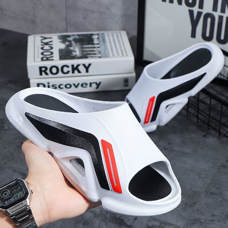 Lightweight, casual unisex slides made from comfortable EVA foam, offering a cushioned walking experience.