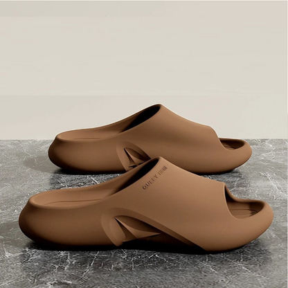 Unisex cloud-soft EVA comfort slides in a casual style for indoor and outdoor wear.