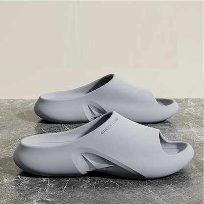 Lightweight, breathable EVA comfort slides. Unisex footwear for cloud-soft feel, perfect for casual indoor/outdoor use.