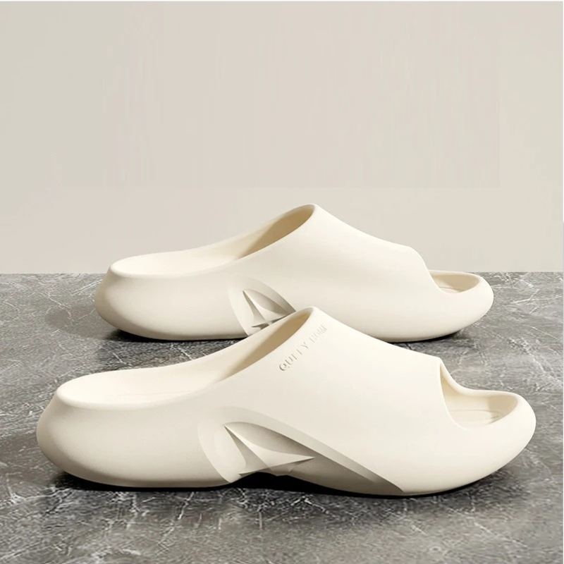 Cloud-soft EVA slides providing ultimate comfort. Lightweight, breathable unisex footwear for casual indoor/outdoor use.
