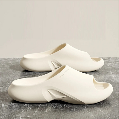 Cloud-soft EVA slides providing ultimate comfort. Lightweight, breathable unisex footwear for casual indoor/outdoor use.
