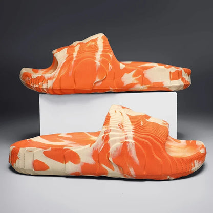 Side view of Cloud-Soft Rio comfort slides, showcasing thick cushioned sole and marbled unisex design.
