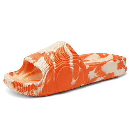 Top-down view of Cloud-Soft Rio slides, featuring marbled pattern, open-toe design, and soft cushioned comfort.