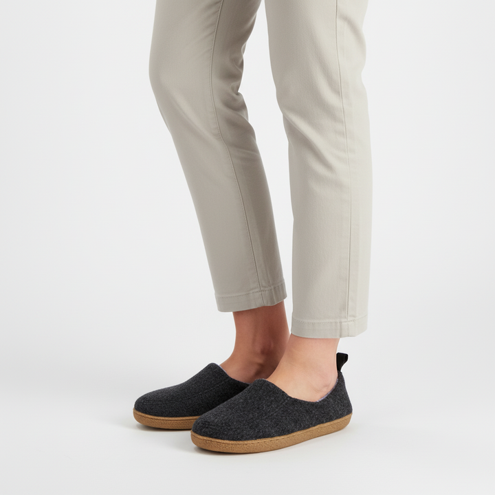 Warm Cloudwalk indoor slippers for men & women, essential for winter foot comfort & relaxation.