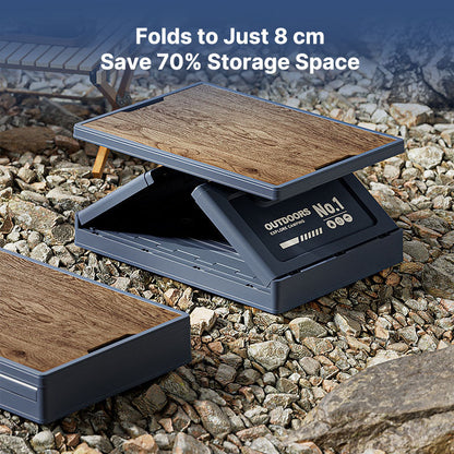 Foldable camping storage unit with a removable wooden lid, doubling as a practical camp table