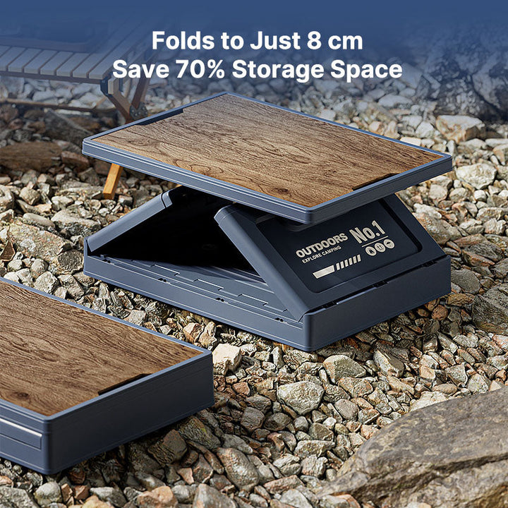 Foldable camping storage unit with a removable wooden lid, doubling as a practical camp table