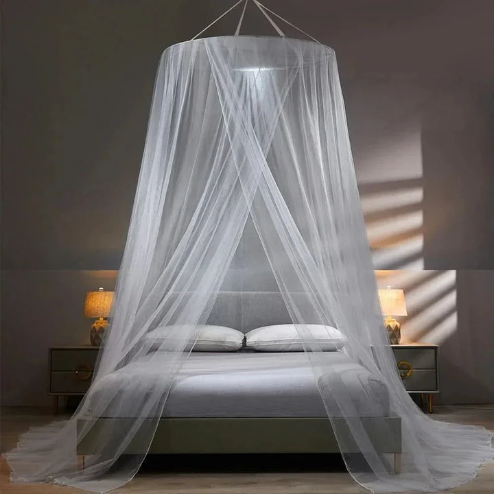 Collapsible bed canopy mosquito net provides insect protection for peaceful, bug-free sleep.