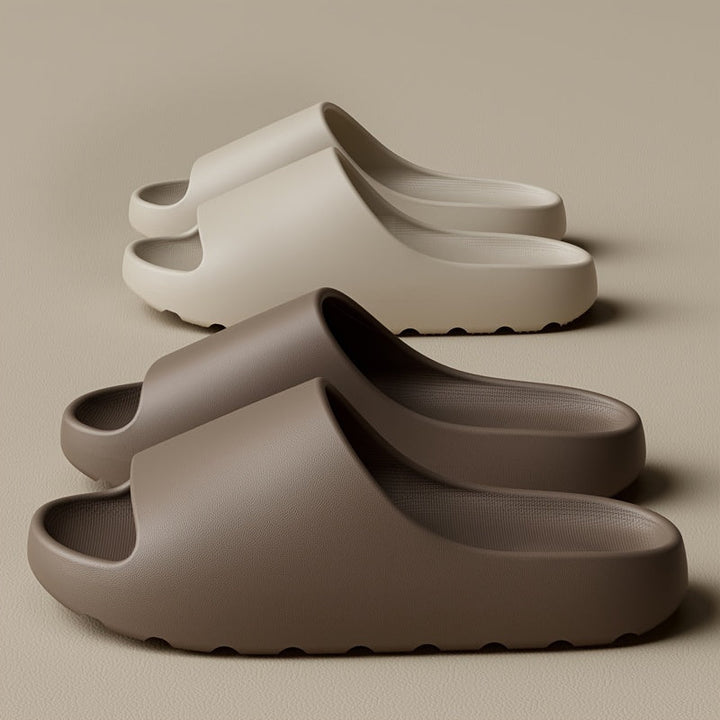 Unisex comfortable waterproof open toe EVA slippers, perfect for house, pool, or shower. Easy slip-on design.
