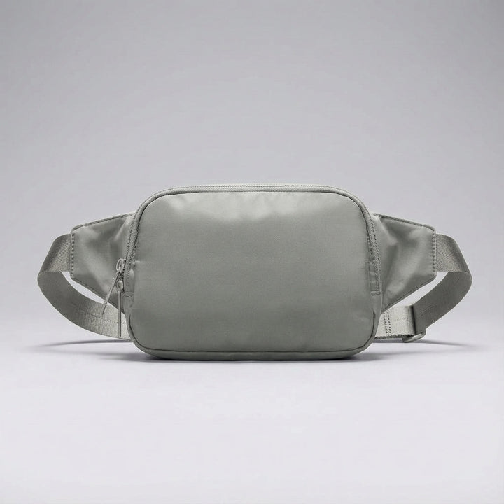 Everyday carry nylon fanny pack, slim and organized design. Unisex for travel or daily errands.