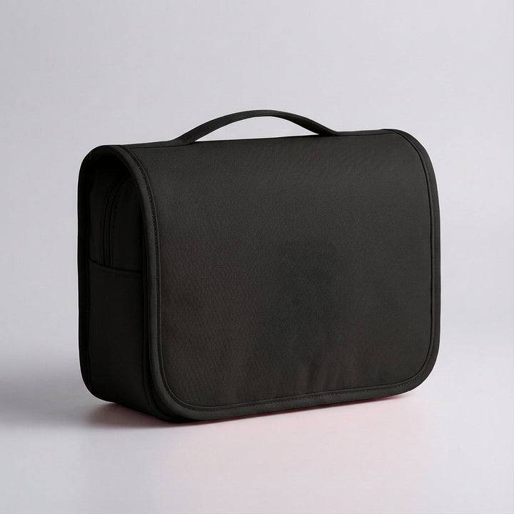 Compact travel toiletry organizer bag. Space-saving design for carry-on or luggage.