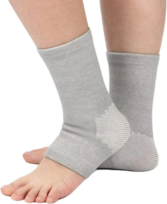 Unisex compression foot sleeves for active relief, providing arch & ankle support, boosting circulation & pain relief.