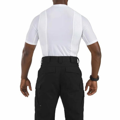 Comfortable unisex compression shirt with integrated holster for secure, ambidextrous concealed carry.