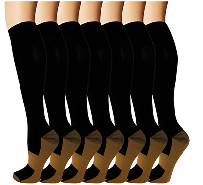 Unisex copper compression socks for enhanced circulation, anti-fatigue, and swelling reduction. Ideal for travel & recovery.