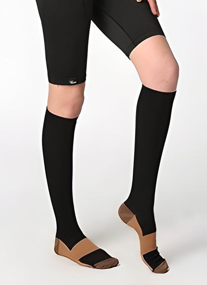 Supportive unisex copper compression socks for nurses & athletes, promoting leg relief, circulation, and odor control.