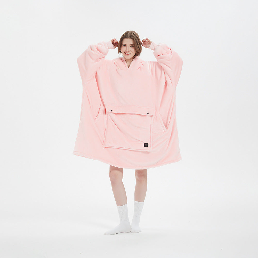 Product shot of the cordless heated flannel hoodie blanket, highlighting its soft fabric and functional design.