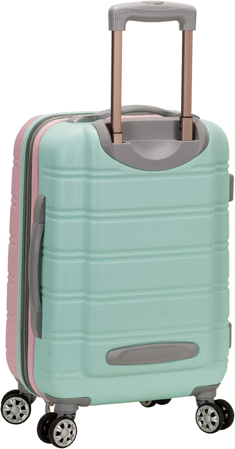 Durable two-tone Cotton Candy hardside carry-on, expandable, with smooth double spinner wheels.
