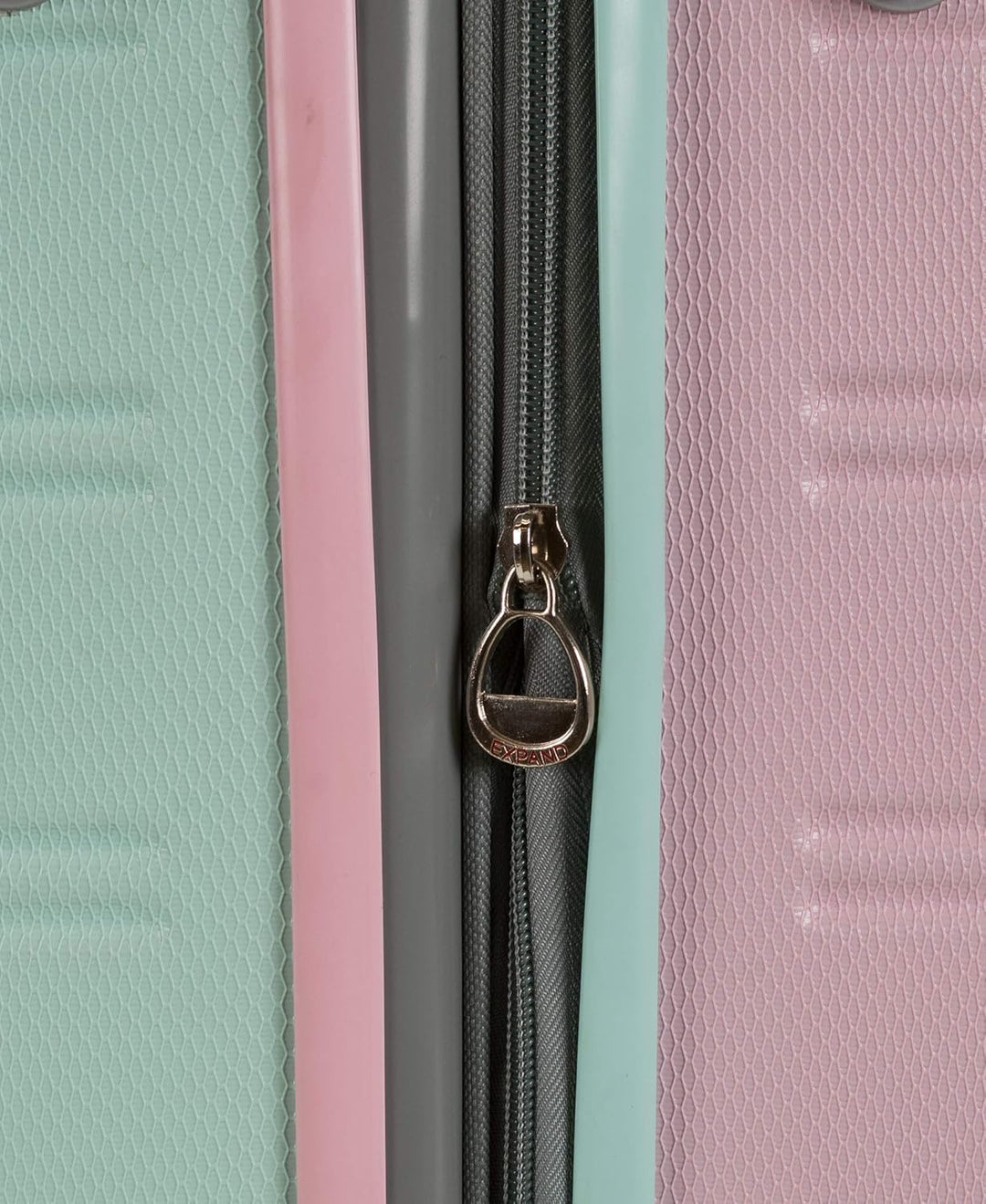 Protective hardside Cotton Candy carry-on luggage, expandable, lightweight, with spinner wheels.