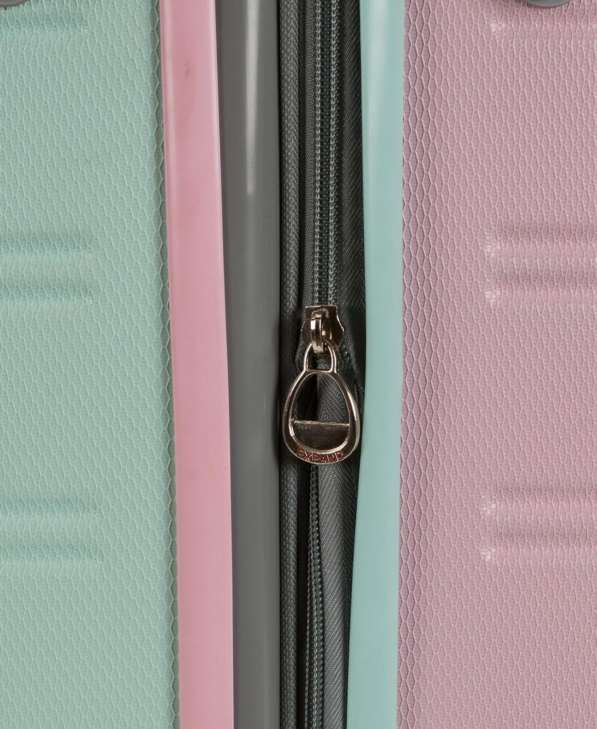 Protective hardside Cotton Candy carry-on luggage, expandable, lightweight, with spinner wheels.