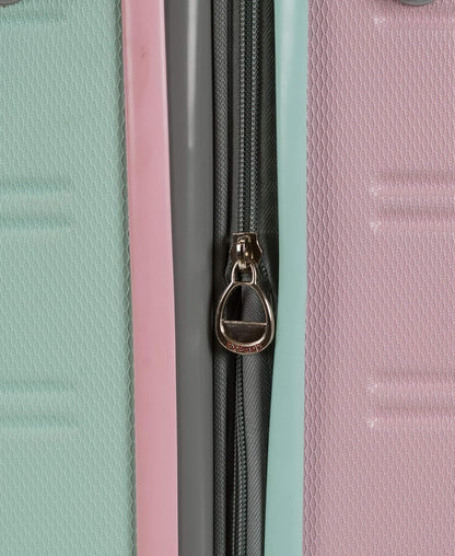 Protective hardside Cotton Candy carry-on luggage, expandable, lightweight, with spinner wheels.