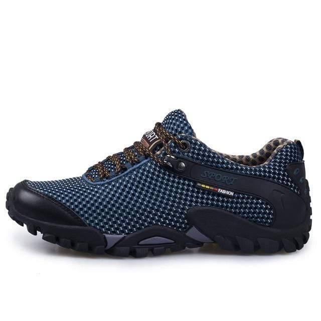 Side view of sturdy cow leather hiking shoes, showing durable outdoor design