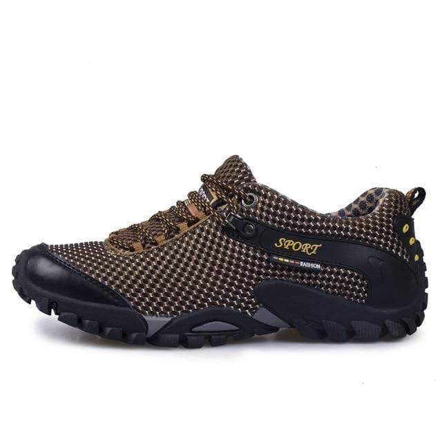 Unisex leather trekking shoes, front view highlighting breathable design for climbing
