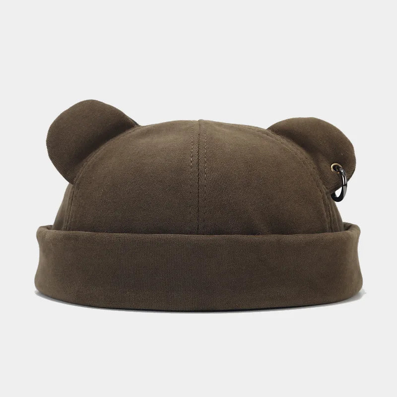 Warm unisex bear hat. This cozy winter beanie with ears is a playful fashion accessory for cold weather.