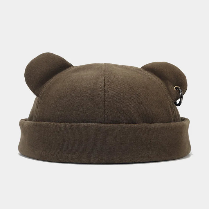 Warm unisex bear hat. This cozy winter beanie with ears is a playful fashion accessory for cold weather.