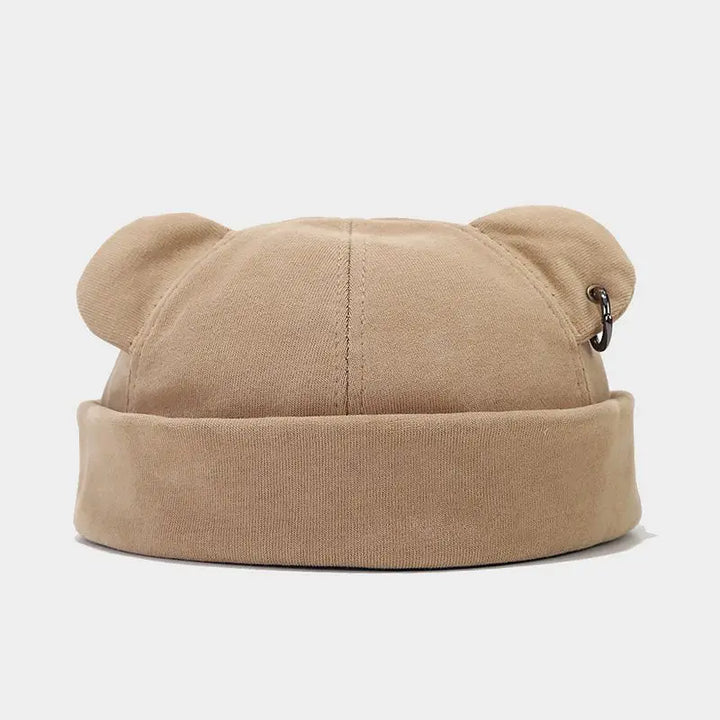 Playful bear cub beanie hat, a cozy unisex accessory with cute ears for adding fun to your winter outfit.