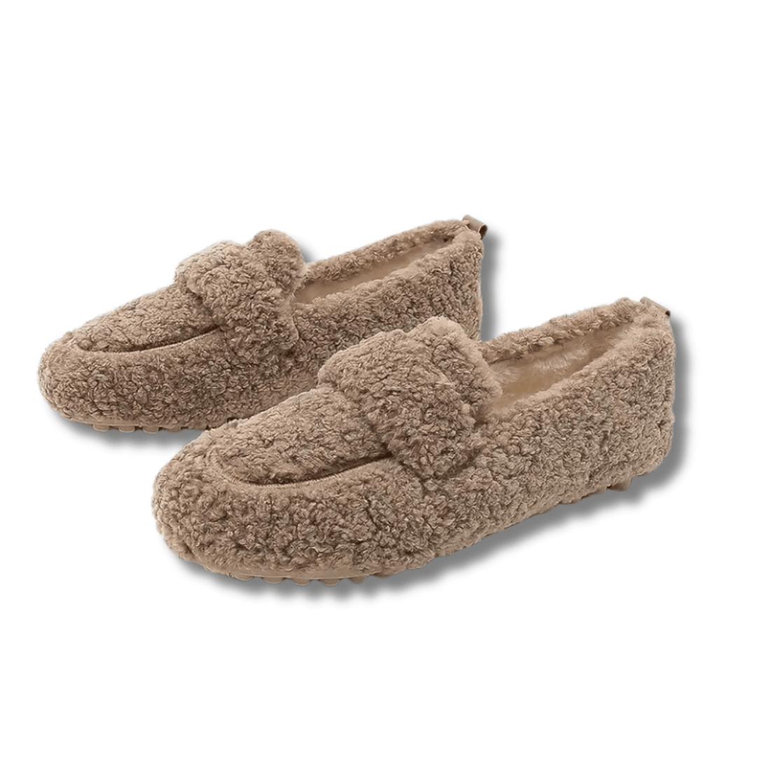 Cozy winter house slippers for ultimate warmth at home. Non-slip indoor footwear for men & women.