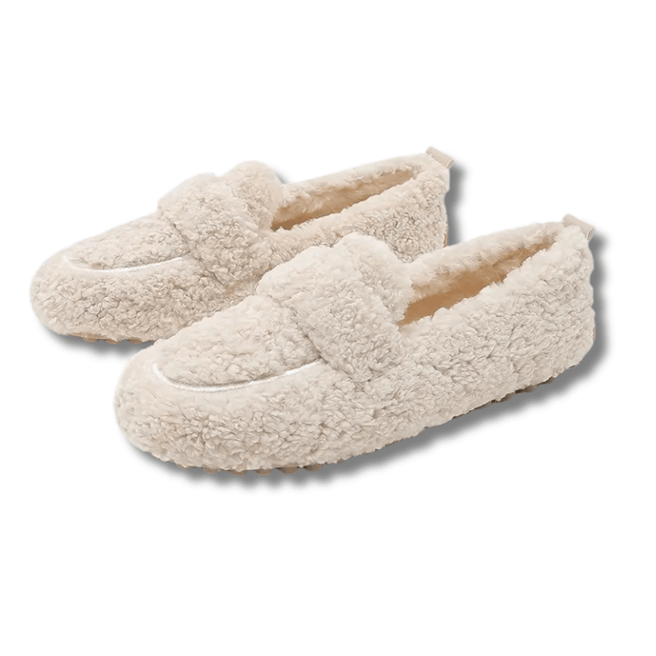 Warm & cozy winter house shoes for women & men. Comfortable, non-slip indoor slippers for ultimate warmth.