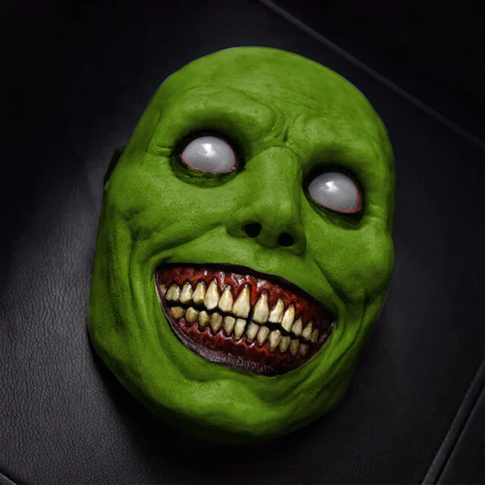 Scary latex demon mask featuring a creepy smiling face and white eyes, perfect for Halloween parties.