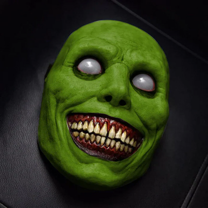 Scary latex demon mask featuring a creepy smiling face and white eyes, perfect for Halloween parties.