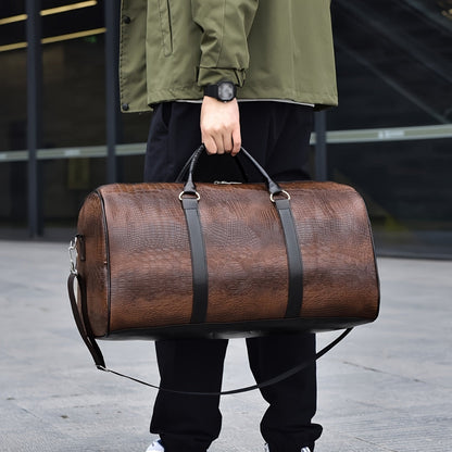 Unisex croc-embossed vegan leather weekender duffle bag. Stylish & durable travel bag with shoulder strap.