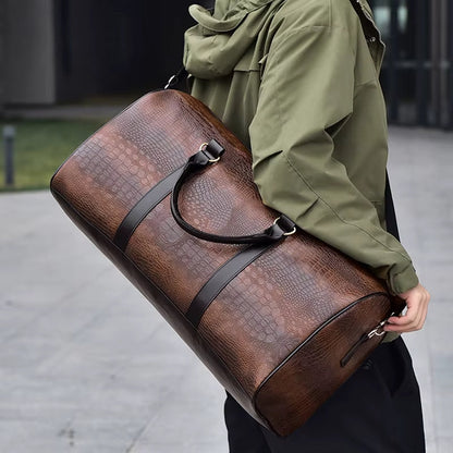 High-quality vegan leather duffle bag with croc-embossed texture. Unisex travel & gym bag, waterproof.