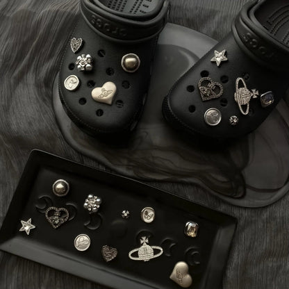 Unisex Croc shoe charms set for personalized style. Metal Lost Saturn & chrome designs for clogs.