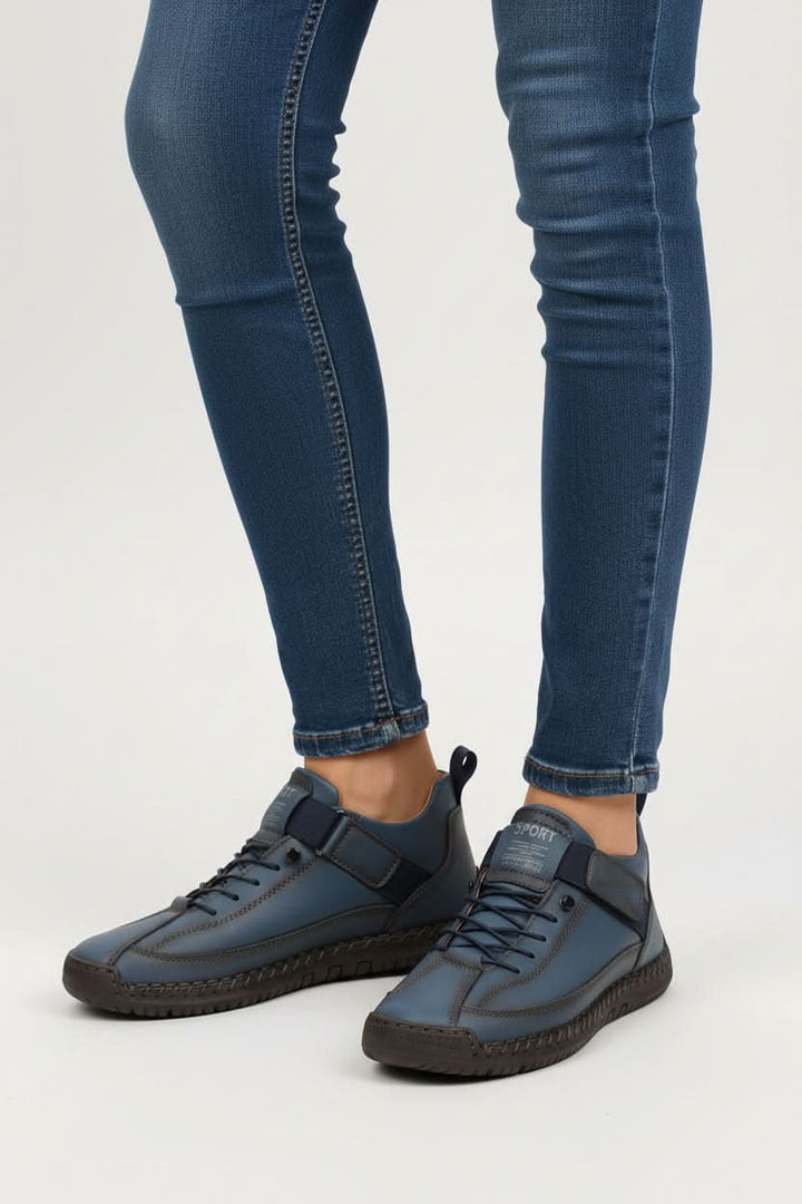 Side view of versatile unisex walking shoes, showing breathable design and durable sole.