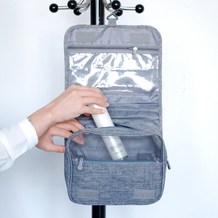 Closed hanging toiletry bag in durable black fabric, ready for any travel adventure.