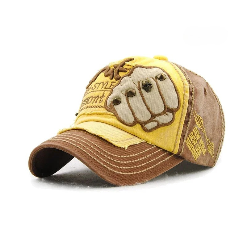 Close-up of a unisex baseball cap showcasing detailed fist embroidery, a unique statement accessory.