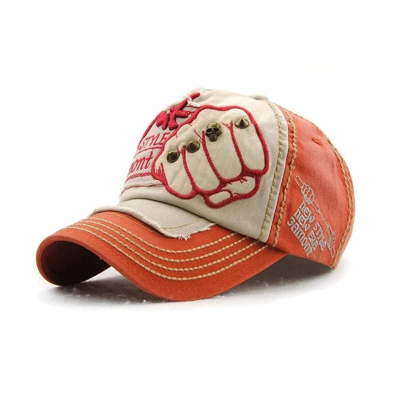 Unisex baseball hat with a strong fist embroidery. This denim cap is edgy and perfect for street fashion.