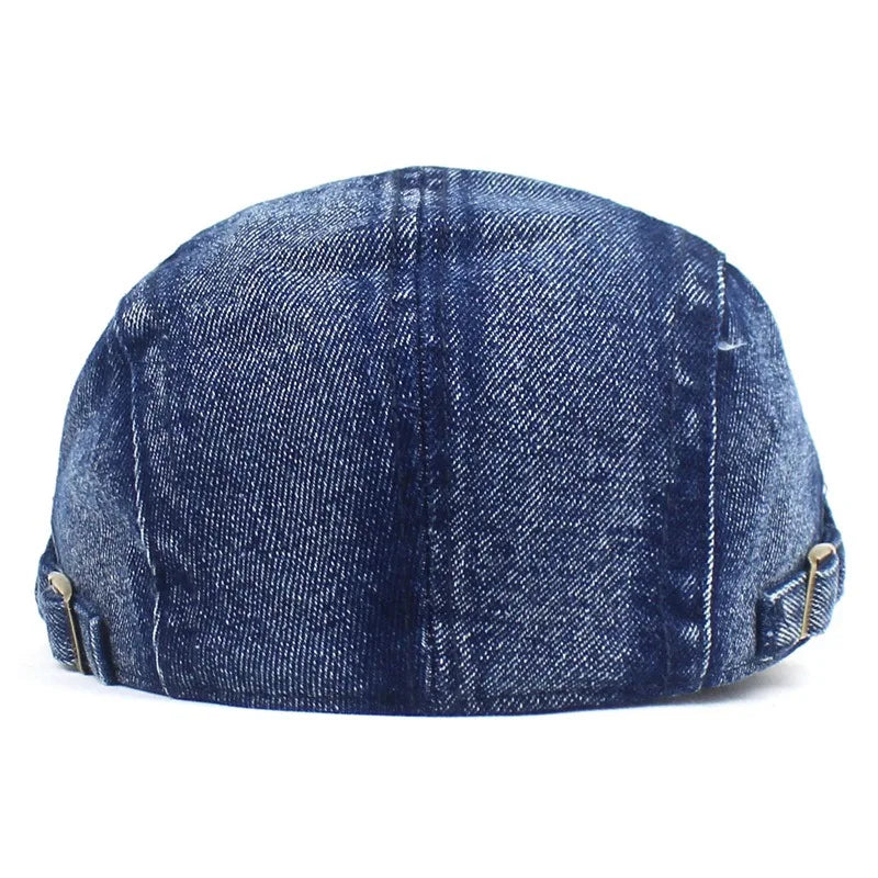 Women's stylish denim ivy cap, a fashionable flat peak hat for versatile everyday outfits.